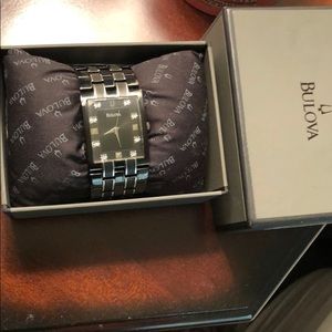 Black bulova watch two tone